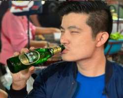 Meiyang Chang consuming alcohol